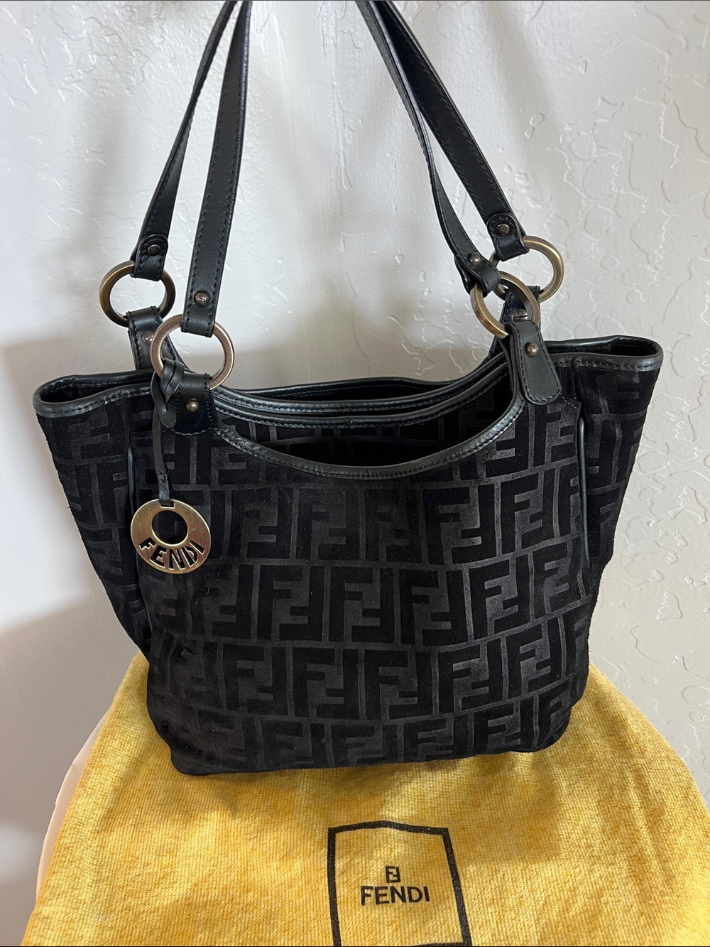 Fendi Black Zucca Monogram Tote with Logo Charm. Authentic